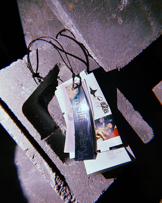 Source Materials Zine Necklace